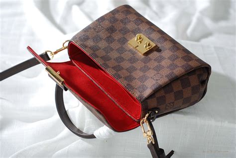 louis vuitton small hand purse.